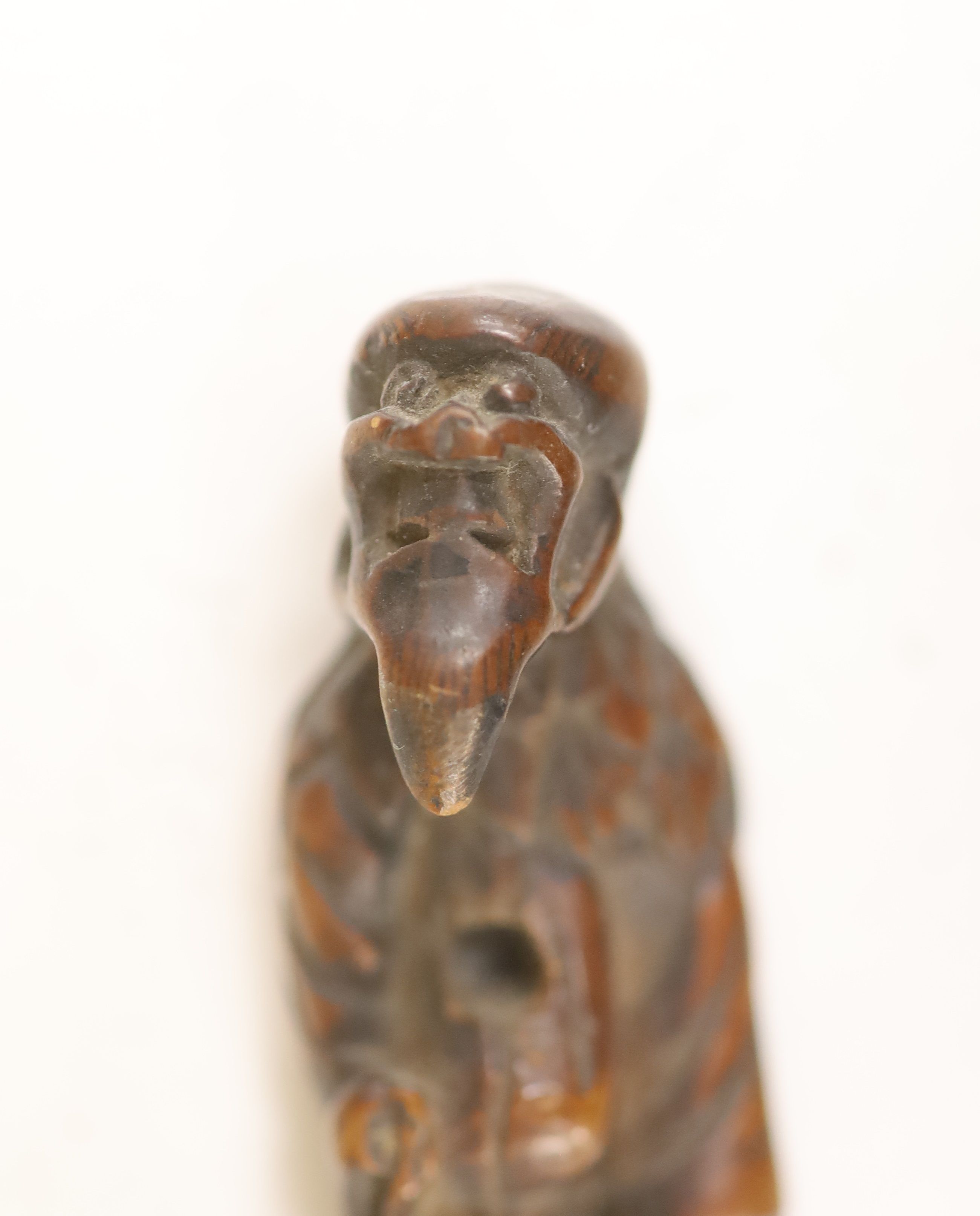 A small miscellaneous Oriental collection including enamel snuff boxes, Buddha carvings etc.